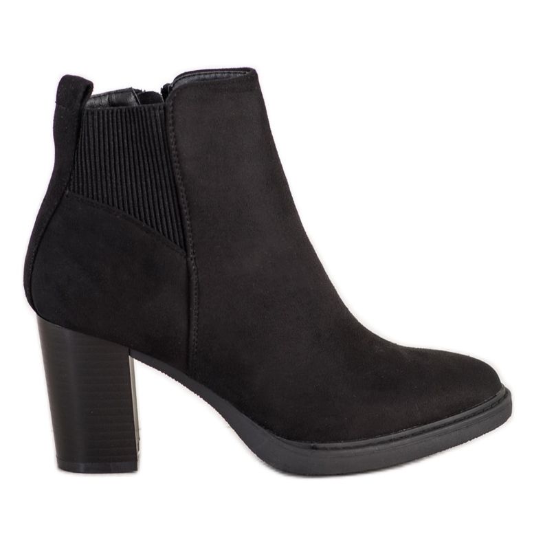 Super Mode Botines negros en un poste Super Mode Botines negros en un poste