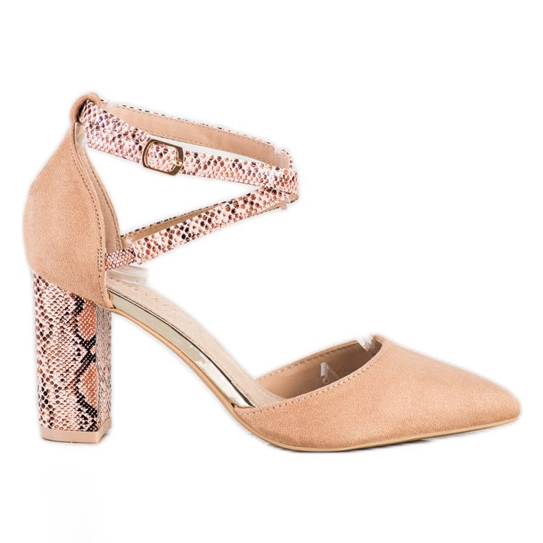 S. BARSKI Bombas con estilo en un pilar marrón S. BARSKI Bombas con estilo en un pilar marrón