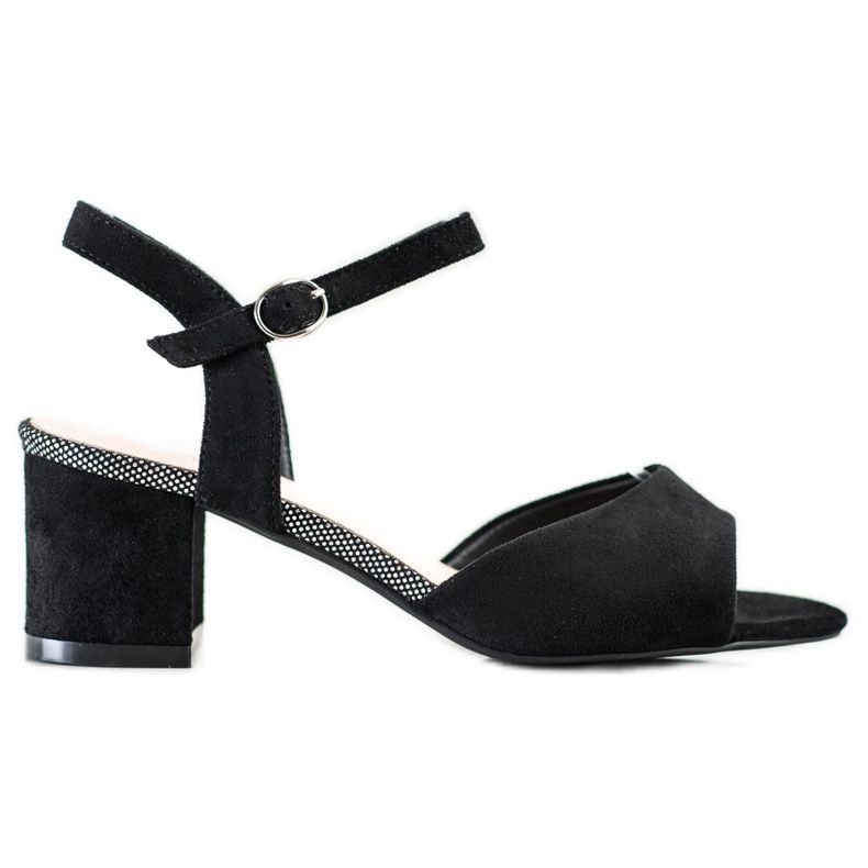 Sandalias negras en un bar Sergio Leone negro