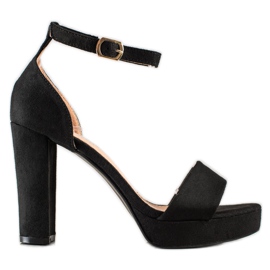 Weide Sandalias negras en una barra negro