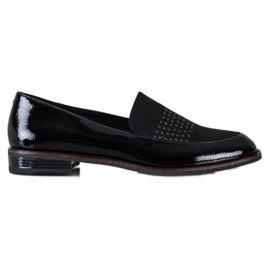 Elegantes zapatos negros de Sergio Leone