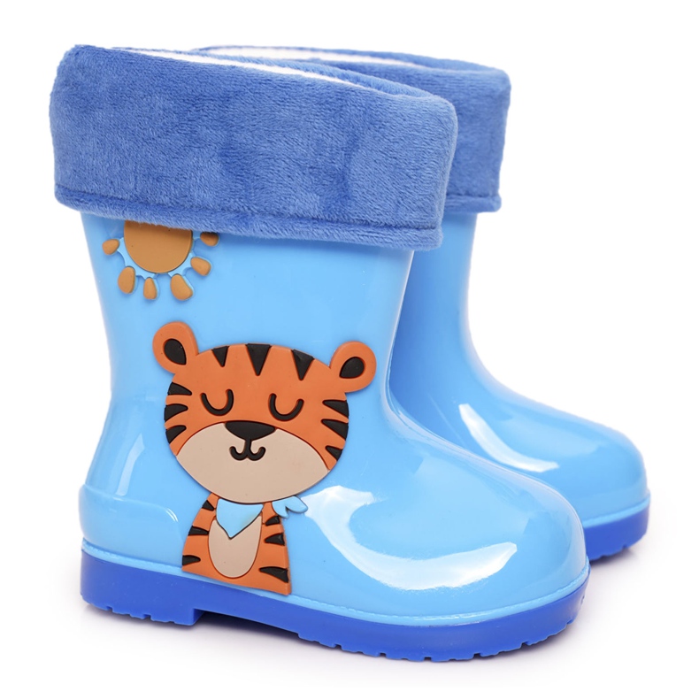 Chanclas infantiles azules aisladas con tigre
