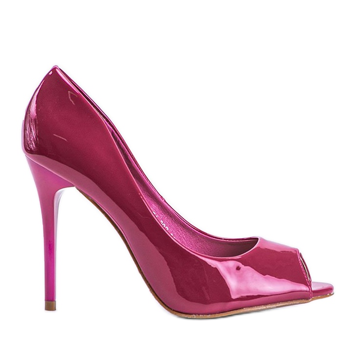Zapatos de salón rosas lacados en un tacón de Luke rosado