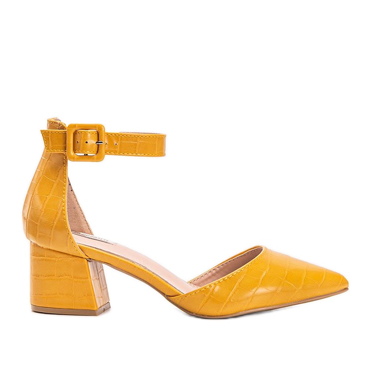 Lanzaderas mostaza en un bloque de Lindsey amarillo Lanzaderas mostaza en un bloque de Lindsey amarillo