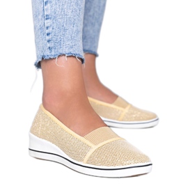 Bailarinas doradas brillantes en la cuña Glam Star dorado