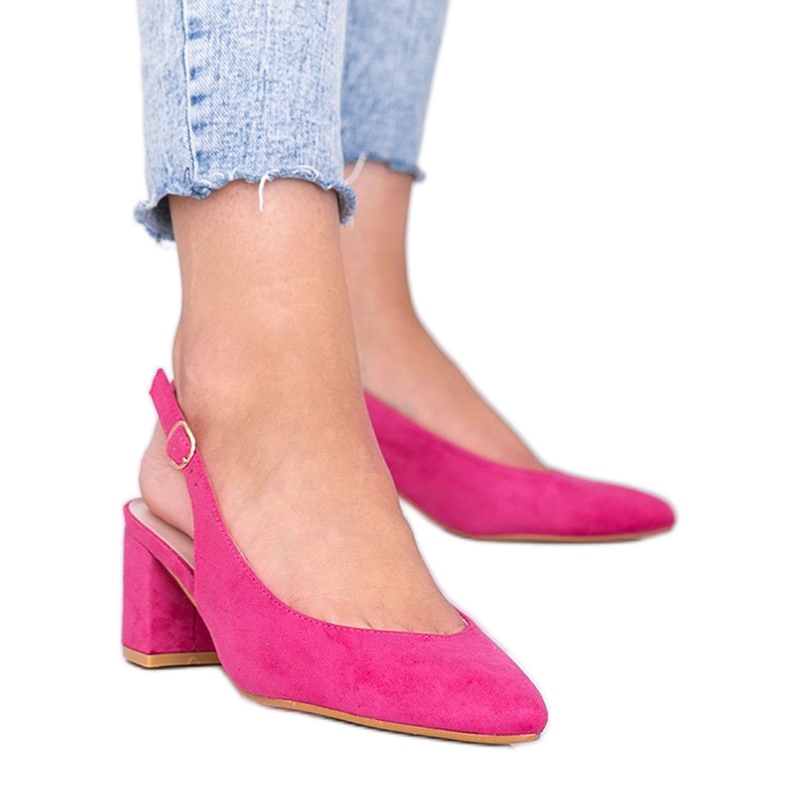 Bombas rosas en el puesto de Petty rosado