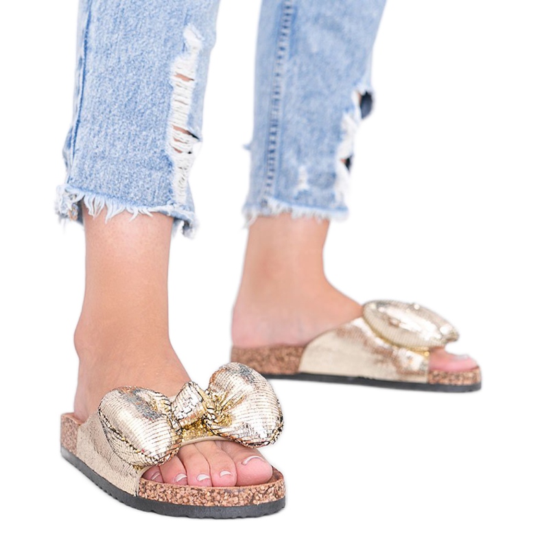 Pantuflas doradas con lazo Norris dorado Pantuflas doradas con lazo Norris dorado