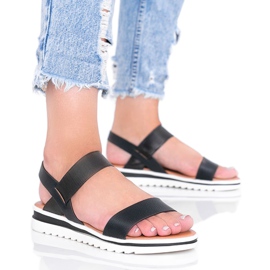 Sandalias negras con suela cro gruesa negro