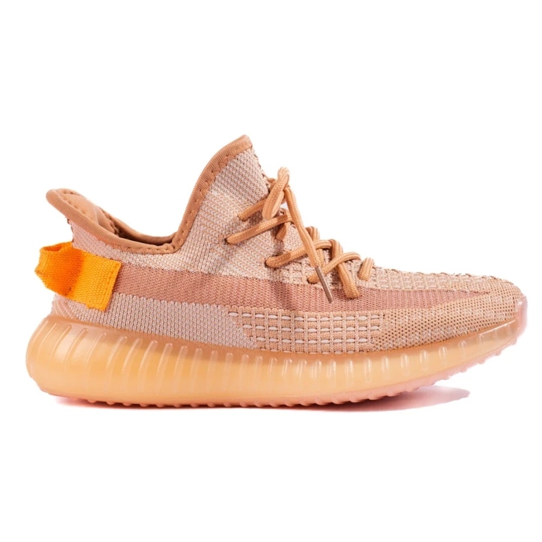 Zapatillas textiles en la plataforma naranja