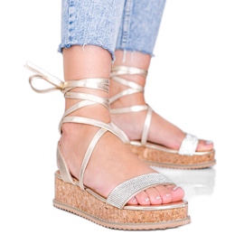 Sandalias doradas atadas con circonitas Ves dorado