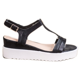 Bestelle Sandalias de cuña relucientes negro