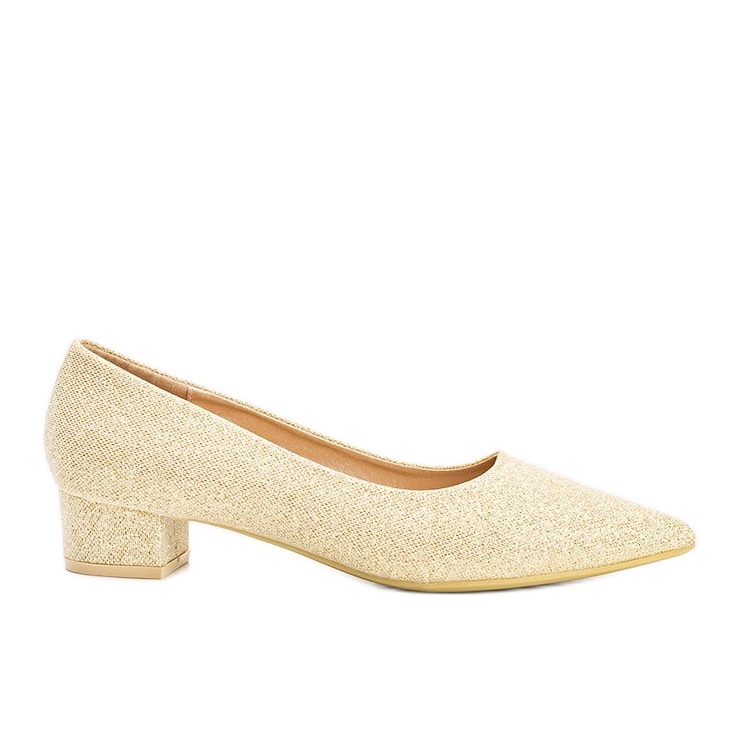 Bombas de oro en un poste bajo de Kennedy dorado Bombas de oro en un poste bajo de Kennedy dorado