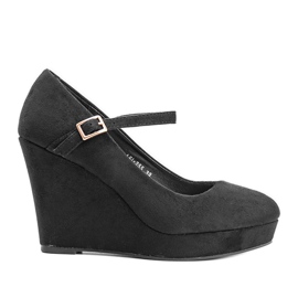 Bombas negras en la cuña Prisca negro