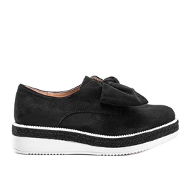 Zapatos negros sobre suela gruesa Sindri