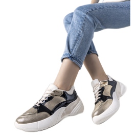 Deportivas doradas con suela alta Rude negro