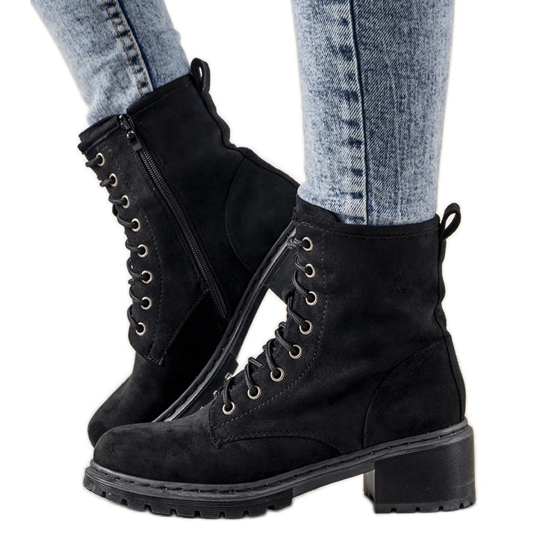 Debe tener botas de mujer negras negro