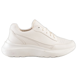 Ideal Shoes Cómodas zapatillas de cuero ecológico beige