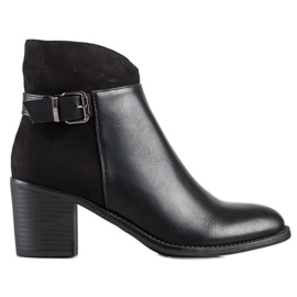 SHELOVET Botines negros en un poste