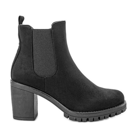 Botines negros en el puesto de Waikiki