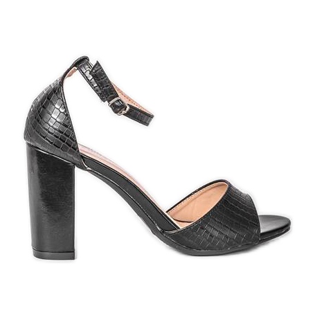 Sandalias negras en un poste de Milano negro Sandalias negras en un poste de Milano negro