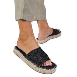 Zapatillas negras para mujeres con cinturón trenzado negro