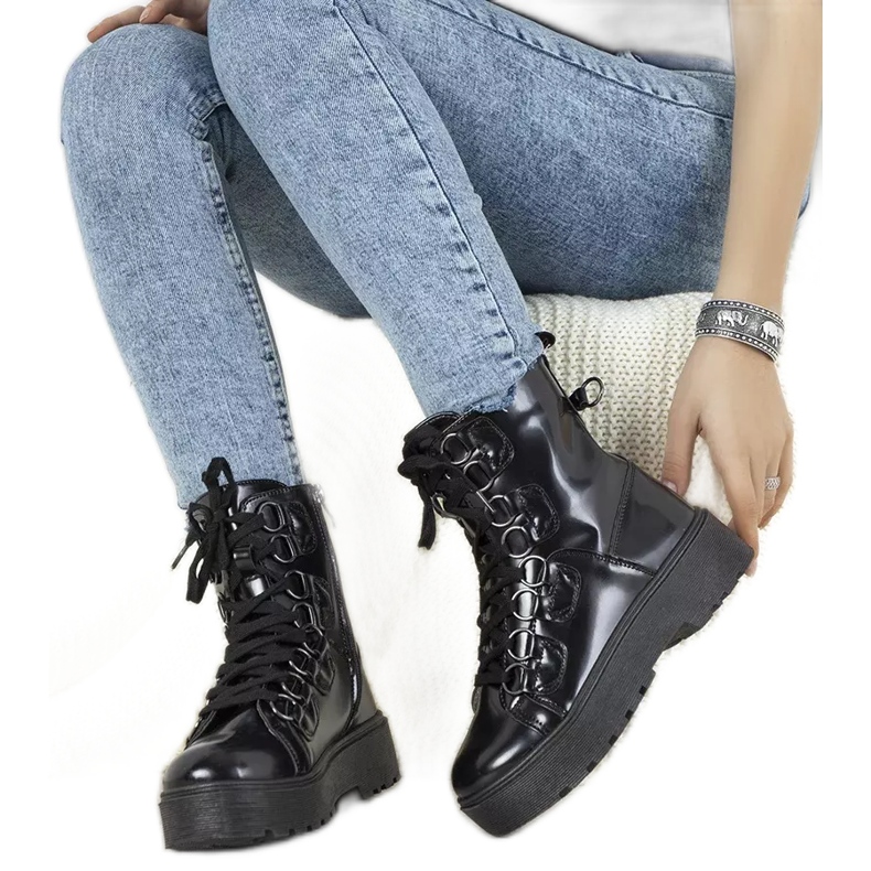 Botas negras sobre suela alta Orane negro