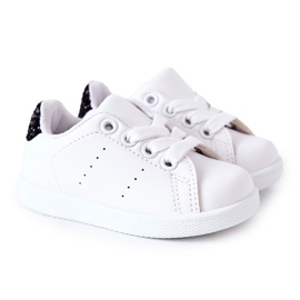 Zapatillas infantiles blancas y negras brillantes blanco