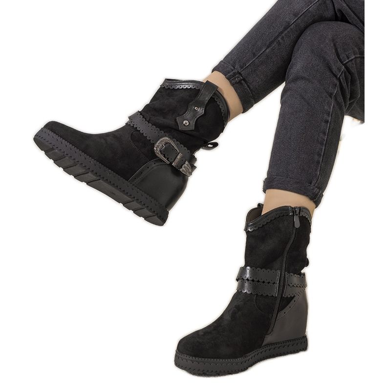 Botas de mujer negras con aislamiento en la cuña Sherry negro Botas de mujer negras con aislamiento en la cuña Sherry negro