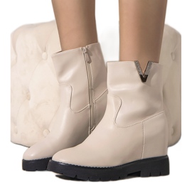 Botas de mujer beige en la cuña Goldie crudo