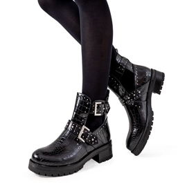 Botas blancas con recortes de Rolen negro Botas blancas con recortes de Rolen negro