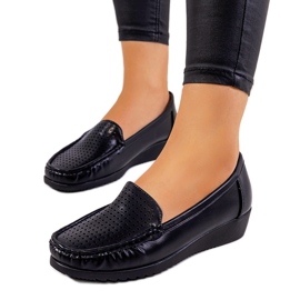 Mocasines negros en el tacón de cuña Dalal