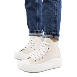 Deportivas beige sobre suela alta Tirado