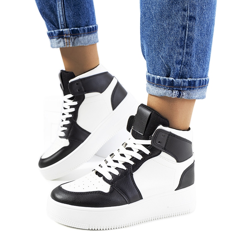 Zapatillas tobilleras Dellucci en blanco y negro