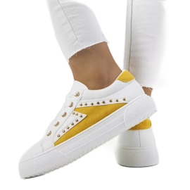 Zapatillas blancas y amarillas de Udinesi blanco amarillo