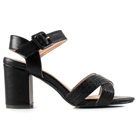 Encor Sandalias negras en una barra negro