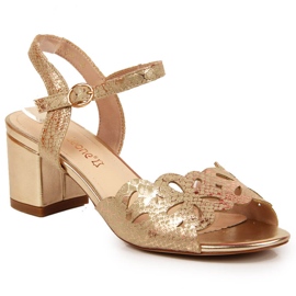 Sandalias de mujer en el poste de oro de Sergio Leone dorado