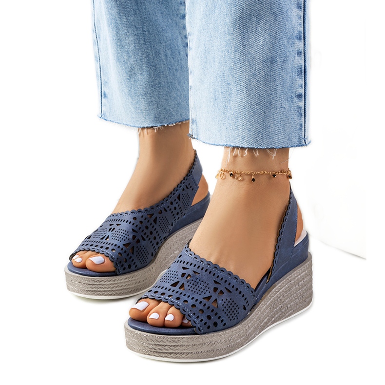 Sandalias caladas azul marino sobre cuña Biblia