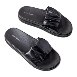 Zapatillas negras en la plataforma Baldwin negro