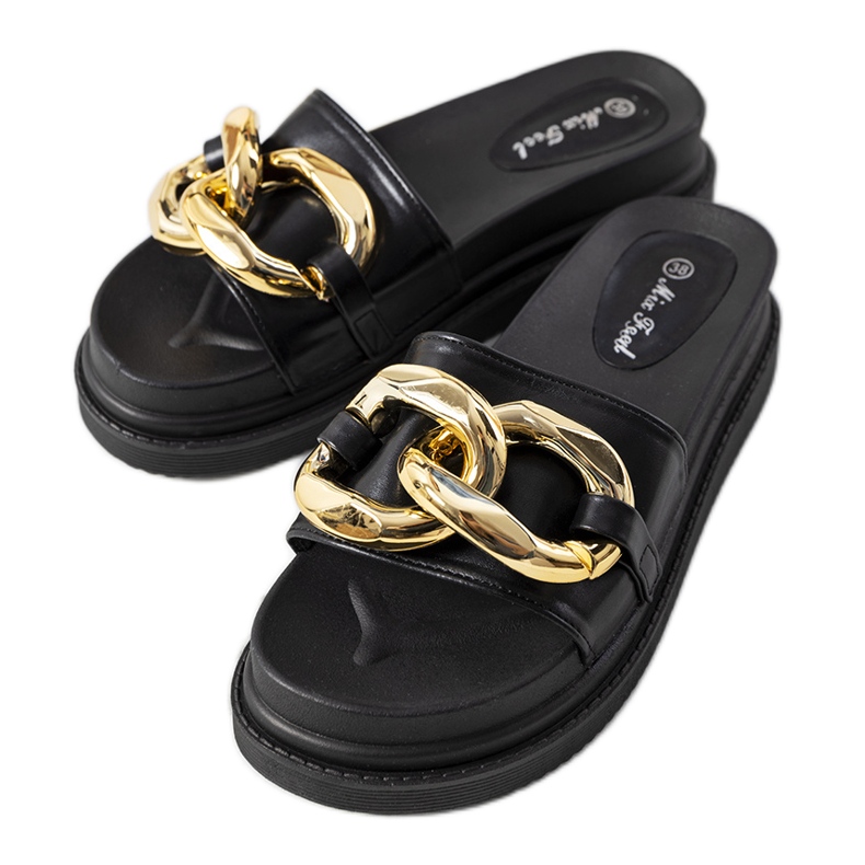 Zapatillas negras en la plataforma de Berloz negro Zapatillas negras en la plataforma de Berloz negro