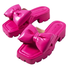 Zapatillas rosas en la suela del tractor Platt