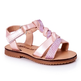 Sandalias infantiles rosas con purpurina.