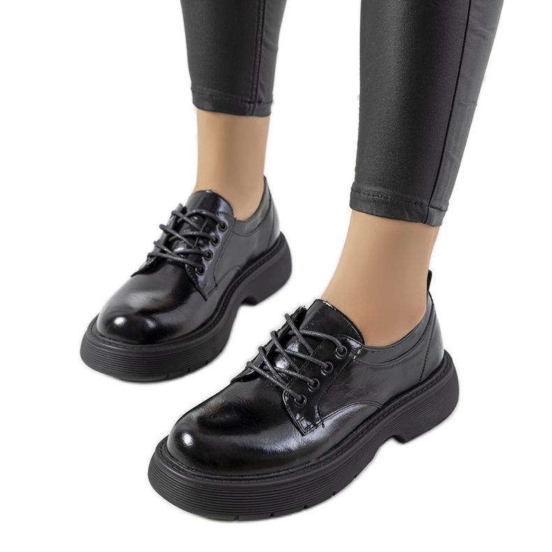 Zapatos negros con cordones en la plataforma Henris Zapatos negros con cordones en la plataforma Henris