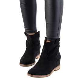 Botas negras en un tacón de cuña Hunjet para interiores negro Botas negras en un tacón de cuña Hunjet para interiores negro