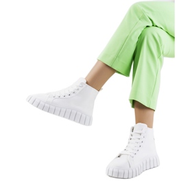 BM Zapatillas blancas en la plataforma Horizo blanco