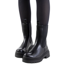 Botas negras con suela alta de Nester negro