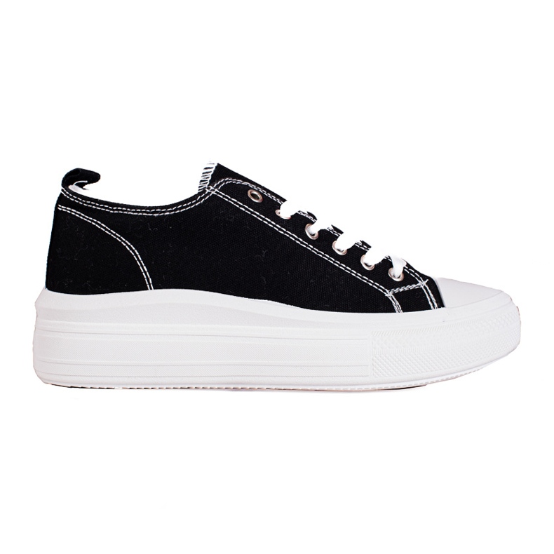 Zapatillas de mujer con cordones en blanco y negro en la plataforma Shelovet.