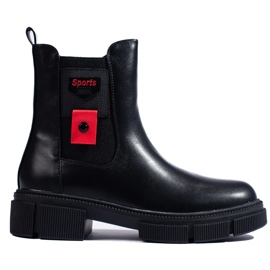 Botas Chelsea de mujer negras con plataforma. negro
