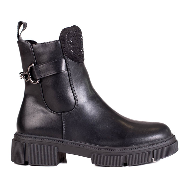 Botas negras de mujer en la plataforma. negro