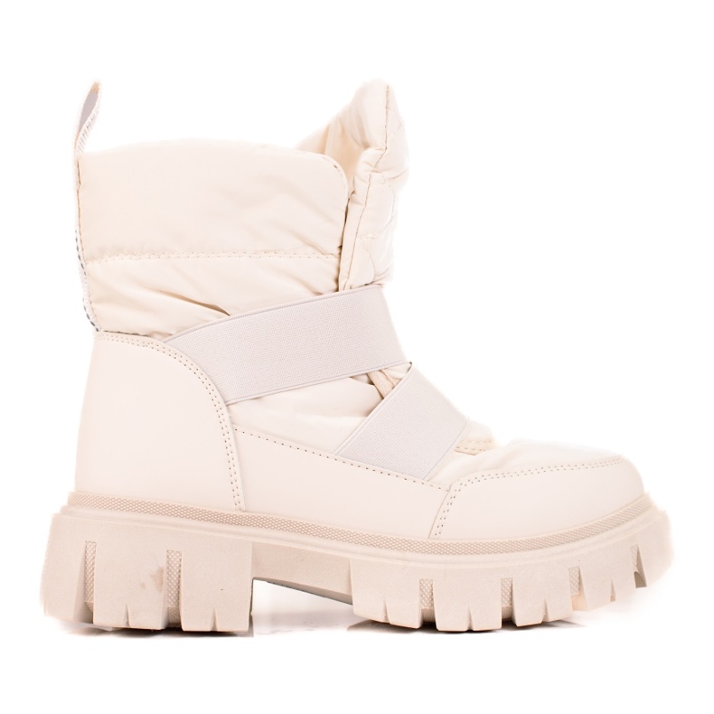 Botas de nieve Shelovet para mujer en una gruesa plataforma beige. marrón