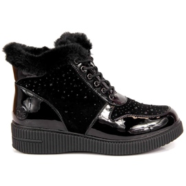 Botas de cuero con aislamiento de cuero negro Rieker 93312-00 en la plataforma